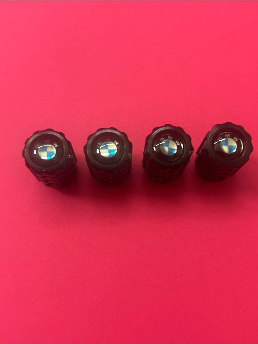 BMW Black Tire Valve Stem Caps with Blue-White Logo - Set of 4